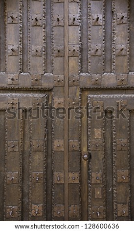 Old wooden door, old door detail of classic wood texture background with historical