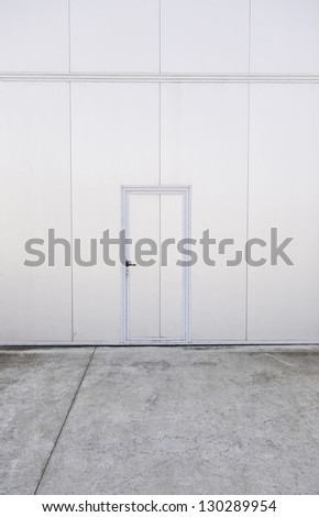 Closed metal door, closed door detail in a factory, protection, textured background