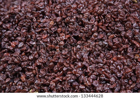 Red dried raisins, dried fruit red detail, traditional Spanish food, fresh fruit, food