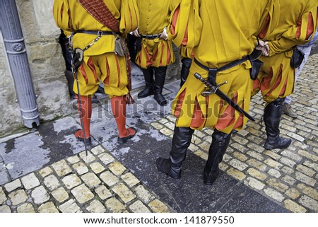 Group medieval warriors, detail of a recreation of the Civil War, military uniform
