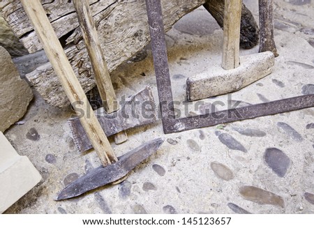Old medieval hammers, detail of ancient and old tools, metal
