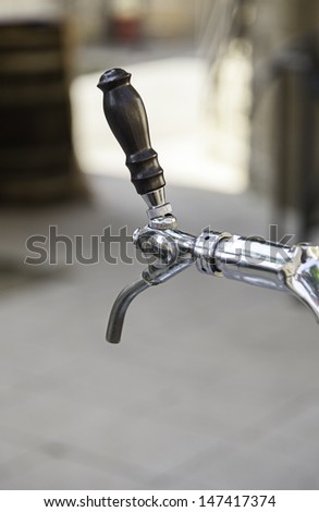 Cold beer tap, detail of a beer dispenser, cold drank alcoholic