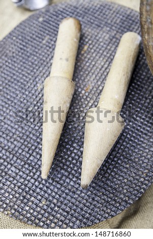 Metal and wood mold, detail of old tools of manufacture, textured background
