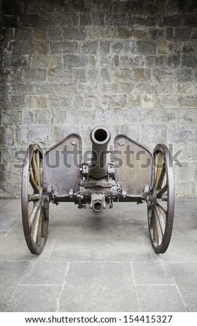 Old war cannon, detail of an ancient weapon of war and destruction, classic and historic