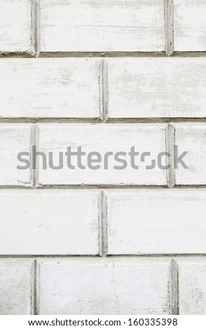 Cement wall white brick, detail of a painted white wall, facade and architecture