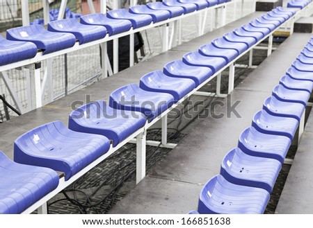 Bleachers in a football stadium, detail of a sports venue, seating for spectators