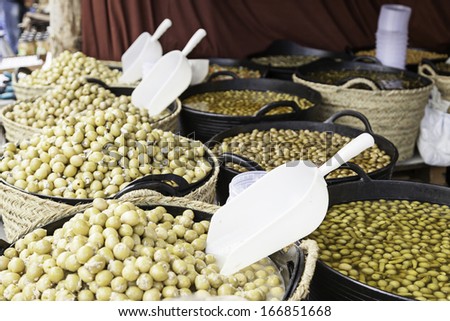 Olives in a store, detail of olives in a market, selling food, healthy food
