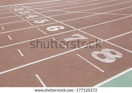 Detail of an athletics track, detail of a running track, outdoor sports, aerobic sports, output numbers