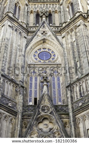 Facade of Gothic church, detail of a historical landmark in the city, art and religion