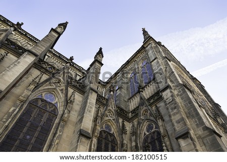 Facade of Gothic church, detail of a historical landmark in the city, art and religion