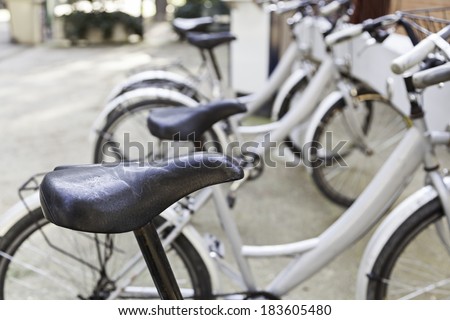 Stops in the city Bicycles, detail of a means of transportation on the street, health and environment