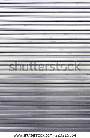 Protective metal door, detail of a protective door, textured background