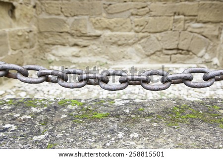 Metal chain in a castle, detail of a chain of protection