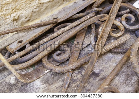 Irons with shapes in a forge, manual labor detail, forging