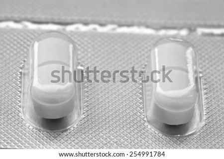 Medicine concepts. Macro picture of capsule pills in the plate