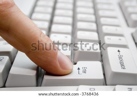 finger presses the key \