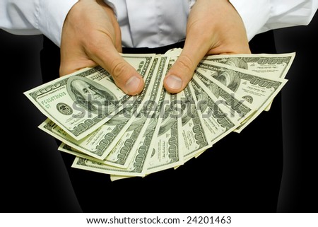 Businessman Holds Money In Black Businessman Holds Money In Black Stock Photo