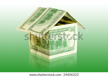 real estate concepts. money house over green background