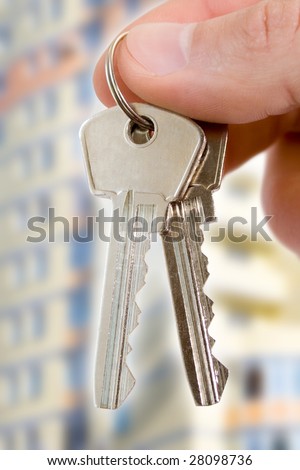 real estate concept. two keys in fingers