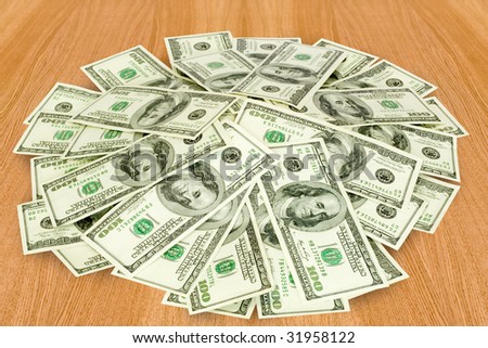finances. big pile of money over table