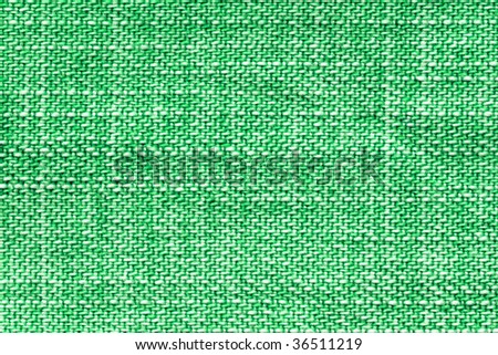 textured background from the green jeans trousers