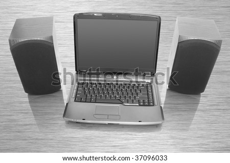 multimedia centre. modern laptop with computer speakers