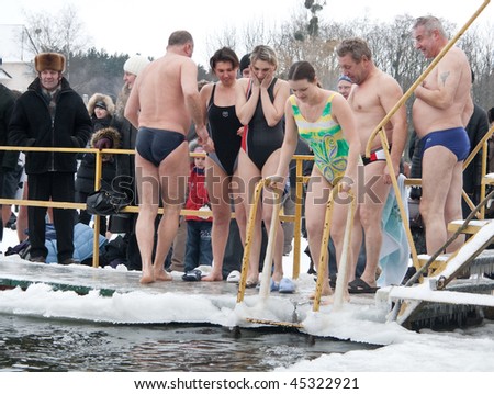 VINNITSA - JANUARY 19: Annual performance of fans of winter swimming on city lake. The organizer - club 