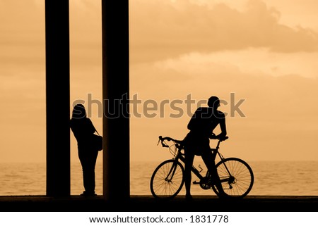 Silhouettes of woman and man.