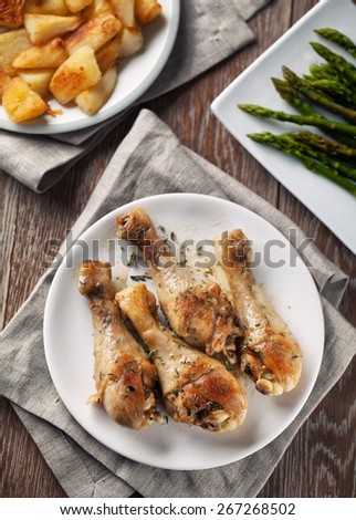 Roast chicken with potatoes and asparagus