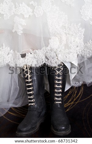 stock photo A bride wearing her wedding dress with boots