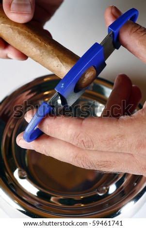 how to serve and cutoff  cigar in luxurious bar and restaurant