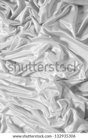 Soft silky white satin drapery, black and white