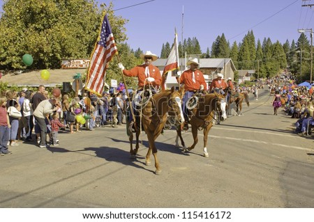 WEST POINT, CA - OCTOBER 6: Unidentified horseback people celebrating the 38th  Lumberjack day  parade, on October 6, 2012 in West Point.