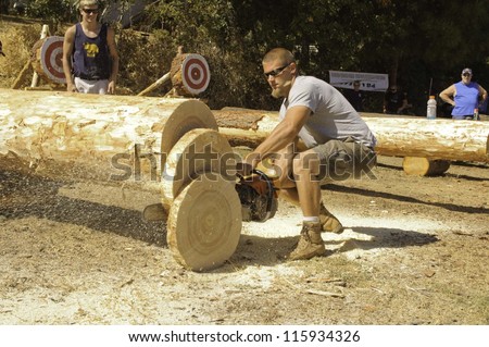 WEST POINT, CA - OCTOBER 6: Unidentified competitor in the men\'s chainsaw log cutting event at the Lumberjack day, on October 6, 2012 in West Point. West Point celebrates it\'s 38th Lumberjack day.