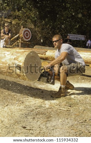 WEST POINT, CA - OCTOBER 6: Unidentified competitor in the men\'s chainsaw log cutting event at the Lumberjack day, on October 6, 2012 in West Point. West Point celebrates it\'s 38th Lumberjack day.