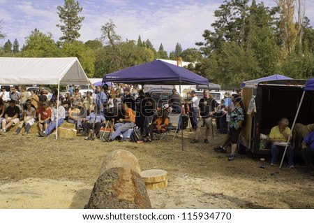 WEST POINT, CA - OCTOBER 6: unidentified audience at Lumberjack day antique axe throwing and log cutting event at the 38th Lumberjack day, on October 6, 2012 in West Point.