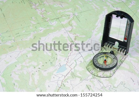 Topographical map with a a compass