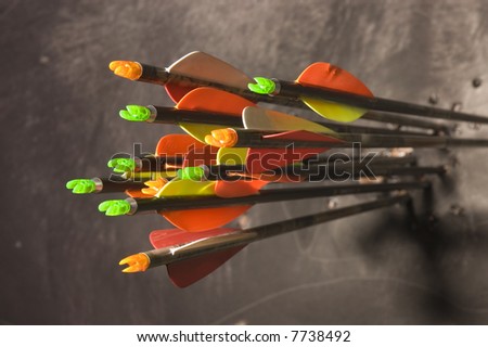A selection of composite and carbon arrows which are on target and tightly grouped