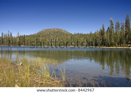 Helen Lake a tree lined Mountain lake in Lassen National Park