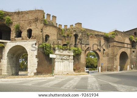 Roman Gate in the wall at the end of Via Veneto, named after Fellini, and the memorial to those killed in the first world war, a combination of ancient roman architecture, and modern functionality