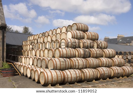 Bourbon Barrels stacked up in the yard of a Scottish distillery ready for use