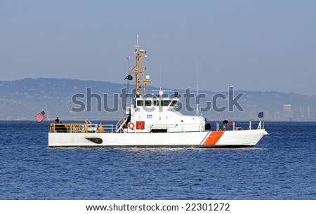 US Coast Guard patrol ship anchored in the San Francisco bay at sunset while on patrol