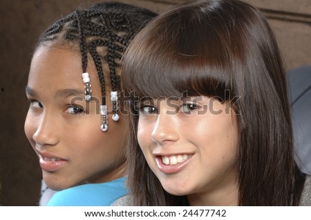 cute african american girl with caucasian girl friend