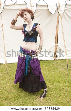 girl dressed up as celtic Gypsy or belly dancer