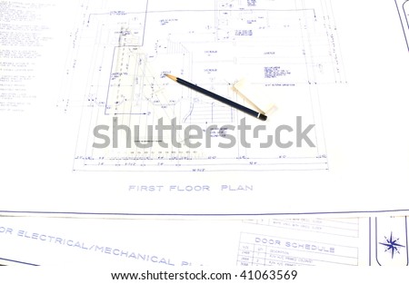 Set of house plans with pencil, eraser and square for blue lining changes