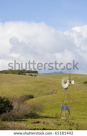 Alternate energy - Wind powered pump with solar panel for the days when there is no wind in central California