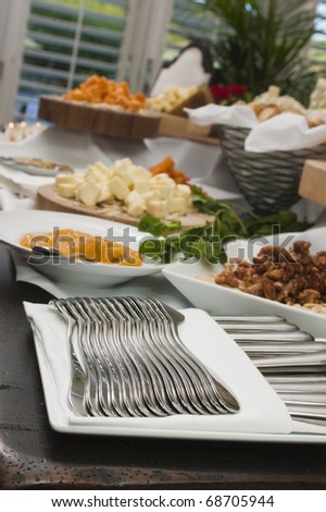 Table of fine foods and cutlery