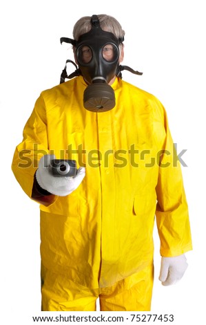 Man in a rubber hazmat suit wearing a gas mask and holding a geiger counter