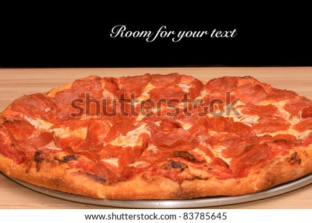 Pepperoni pizza on a pan with space for your text above