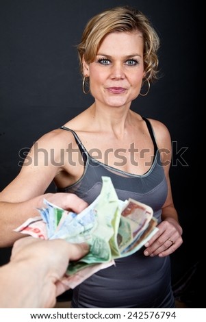 cute girl holding a lot of bank notes
